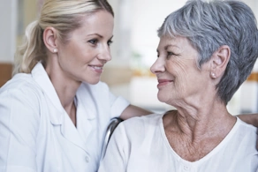 Life Assure Senior Woman Speaking With Caregiver Blog